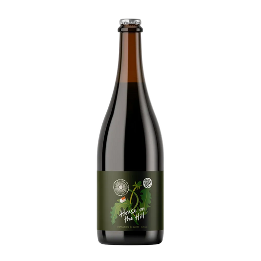 Bottle of 'House on the Hill' beer with a green label